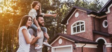 Foto Familie mit Haus